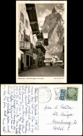Delcampe - Ansichtskarte Mittenwald Adlerhaus Gegen Viererspitze, Geschäfte 1956 - Mittenwald