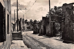 Delcampe - ORADOUR SUR GLANE La Grande Rue 26 (scan Recto Verso)MG2878VIC - Oradour Sur Glane