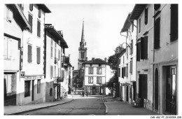 Delcampe - CAR-ADCP7-0458-64 - Le Pays Basque - HASPARREN - La Rue Montante - Hasparren