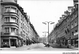 Delcampe - CAR-AAJP6-61-0567 - FLERS-DE-L'ORNE - Rue Du 6 Juin - Pharmacie, Commerces - Flers