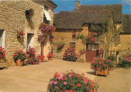 Delcampe - Carte Postale - 22 - Saint Juvat - Ferme Fleurie Des Côtes D'Armor - Fleurs - CPM - Voir Scans Recto-Verso - Poscard - C - Saint-Juvat