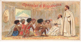 Delcampe - CHROMO #CL30986 CHOCOLAT D AIGUEBELLE PRETRES MISSIONNAIRES CATECHISME HABITATION TRADITIONNELLE OCEANIE - Aiguebelle