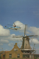 Delcampe - Nederland Oosterbeek Klm Sikorsky S 61N Helikopter Boven Windmolen #SCK861 - Hubschrauber