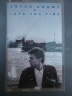 Delcampe - Into The Fire Cassette Am Records 393907-4 - Cassettes Audio