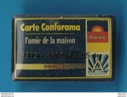 Delcampe - PIN'S //  ** CARTE CONFORAMA / AURORE ** - Bancos