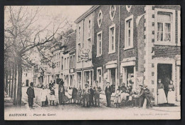 Delcampe - Bastogne - Place Du Carré - Très Animée - Circulée 1912 - Edit. Schumacker - Voir Scans - Bastogne