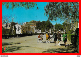 Delcampe - CPSM/gf  BENAGUACIL (Espagne)   Avda. De Montiel Y Santuario Al Fondo, Animé. *2874 - Valencia