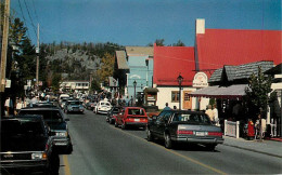 Delcampe - DT-SAUVEUR-DES-MONTS, QUÉBEC -  RUE PRINCIPALE ANIMÉE DE VOITURES - CIRCULÉE EN 1985 -  PHOTO, ANDRÉ JONCAS - - Sonstige & Ohne Zuordnung