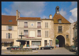 Delcampe - CPSM / CPM 10.5 X 15 Seine Et Marne TOURNAN EN BRIE La Fontaine Et Le Porche  Commerce Hôtel Et Café La Croix Blanche - Tournan En Brie