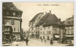 Delcampe - 68.THANN.GRAND'RUE.LIBRAI RIE PAPETERIE.COIFFEUR.DROGUE RIE.MAGASIN CAMILLE ERHARD - Thann